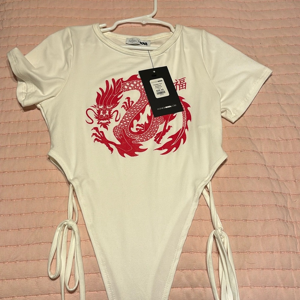 White Fashion nova body suit in size xs